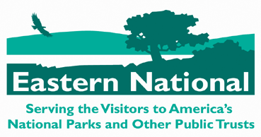 A silhouette of trees, a lake, and hills with a bird flying overhead. Eastern National's logo.