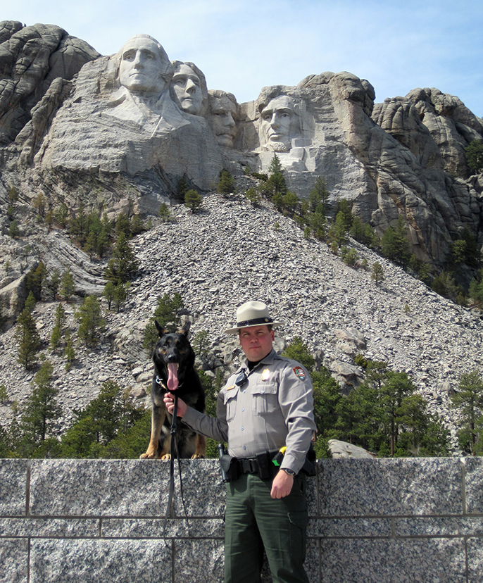Law Enforcement Park Ranger Duane Grego with canine partner Aba, a 17-month old German Shepherd trained in explosives detection.