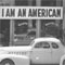 I Am An American Sign on Store Front