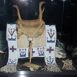 This beaded saddle blanket is an example of the items displayed in the Cook Gallery.