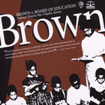 Cover of Brown teacher's guide with image of young student standing up to read to her teacher.