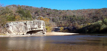 Downriver view of Skull Rock at higher water near Buffalo Point on the Buffalo National River.