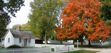 Herbert Hoover Birthplace Cottage in autumn.