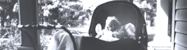 Infant Margaret Truman in buggy on front porch of Truman Home, 1924.