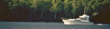 Boater travels west down the Rock Harbor channel.