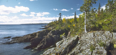 Rocky shoreline bathed in sunshine on the southeast shoreline.