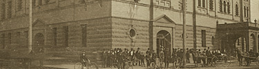 People gather outside the Red Jacket Town Hall and Opera House in this historic photo.