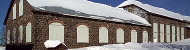 Snow surrounds the former Calumet & Hecla Machine Shop.