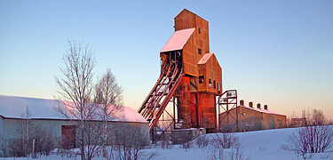 The later afternoon sun illuminates the Shaft-rochouse of the Osceola #13 Mine.
