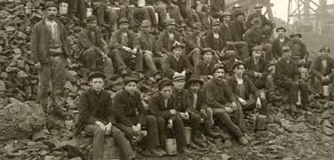 Miners pose for a photo outside the Tamarack mine. Keweenaw NHP Archives photo.