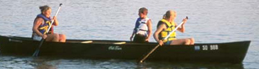 Kids canoeing on the river