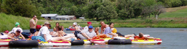 Tubers float the river near Big Cedar Creek