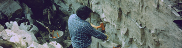 A quarrier working in his quarry pit