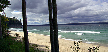 Lake Superior waves roll into the sands of Miners Beach. NPS photo by Dan Johnson