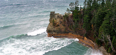 Lake Superior crashes waves into Miners Castle in a classic show of the Gales of November. Photo by John Pepin, The Mining Journal