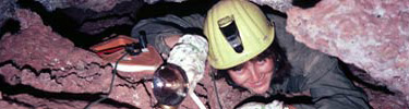 Surveying through a tight spot in Wind Cave