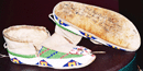 These signed moccasins are in the Cook Collection.