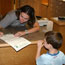 Ranger signing a Junior Ranger certificate Ranger signing a Junior Ranger certificate