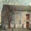 detail of Commissary building with bare tree on left hand side