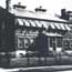 courthouse building converted as welfare offices with awnings on windows
