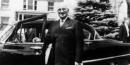 Harry Truman next to an automobile. Credit: Truman Library.