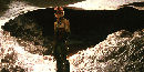 Caver standing in a cave passage / Marc Ohms photo
