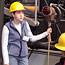 A guide at the Quincy Mine gives a tour of the steam hoist.