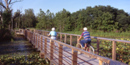 Bikers cross the Beaver Marsh in CVNP. NPS photo.