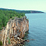 At the Lake Superior State Forest, cliffs tower high above the lake on the Superior's north shore. At the Lake Superior State Forest, cliffs tower high above the lake on the Superior's north shore.