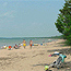 The Lake Superior beach at Brimley State Park invites visitors to linger.