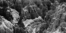 From a 1950 postcard, a black and white photo of the rugged badlands formations From a 1950 postcard, a black and white photo of the rugged badlands formations