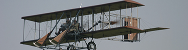 Replica of the Wright military plane flying in October 2005.