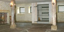 Interior of jail cell with box for prisoners to visit with their lawyers Interior of jail cell with box for prisoners to visit with their lawyers