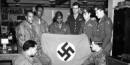 World War II soldiers with captured Nazi flag. Credit: Truman Library World War II soldiers with captured Nazi flag. Credit: Truman Library