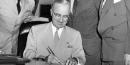 President Truman signs legislation. Credit: Truman Library. President Truman signs legislation. Credit: Truman Library.