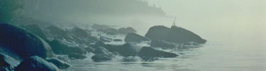 Rocky shoreline in fog near Blake Point