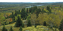 View of the Greenstone Ridge Trail in the fall from the Ojibway Fire Tower. View of the Greenstone Ridge Trail in the fall from the Ojibway Fire Tower.