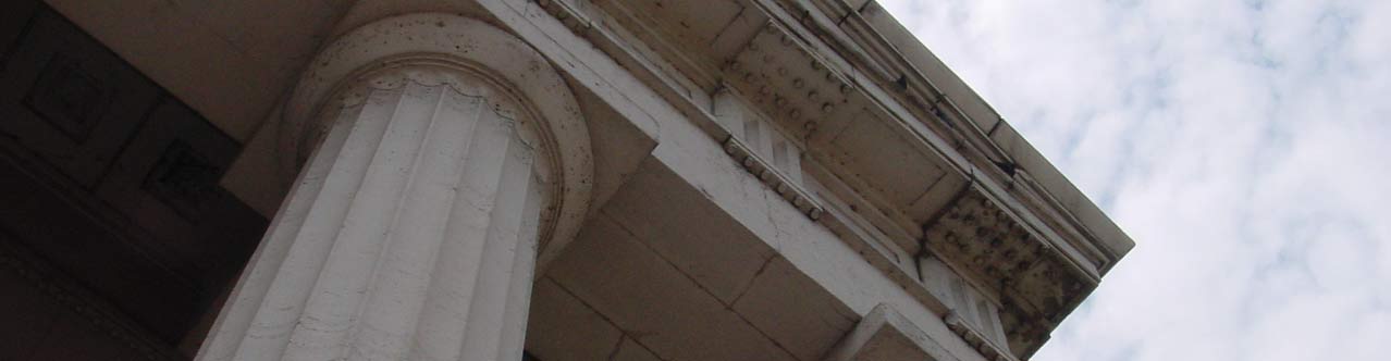 Looking up at the Old Courthouse pediment above the door on the exterior.