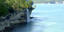 Spray Falls drops 70 feet over the Pictured Rocks cliffs into Lake Superior. Spray Falls drops 70 feet over the Pictured Rocks cliffs into Lake Superior.