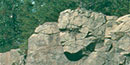 a face profile seemingly formed by a rock wall a face profile seemingly formed by a rock wall