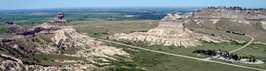 View of Mitchell Pass and the Visitor Center from the summit of Crown Rock.  Photo by Jonathan S. Garcia.