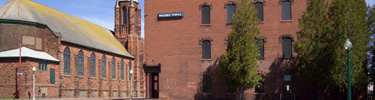 Calumet's Union Building and the former St. Anne's church mark the entrance to Fifth Street.