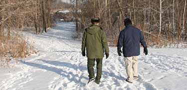 A ranger leads a winter hike.