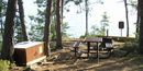 A small campsite on Rainy Lake has a food locker, picnic table, tent pad sites, fire ring and a privy. A small campsite on Rainy Lake has a food locker, picnic table, tent pad sites, fire ring and a privy.