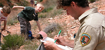 Outdoor education instructor with a local school group