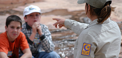 An SCA working with the outdoor education program