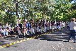 Re-enactors proceed to the grave site.