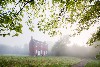 foggy morning at the historic brick Gordon House