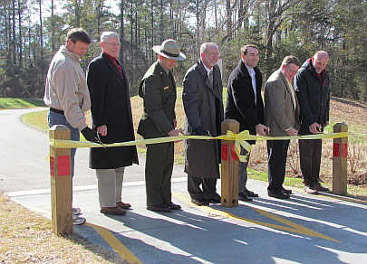 6 park partners join superintendent Sholly for the multi-use trail ribbon cutting