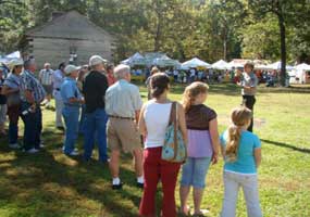 Visitors join a ranger for a program.